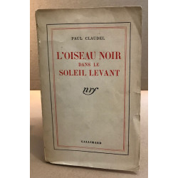 L'oiseau noir dans le soleil levant
