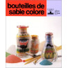 Bouteilles de sable coloré